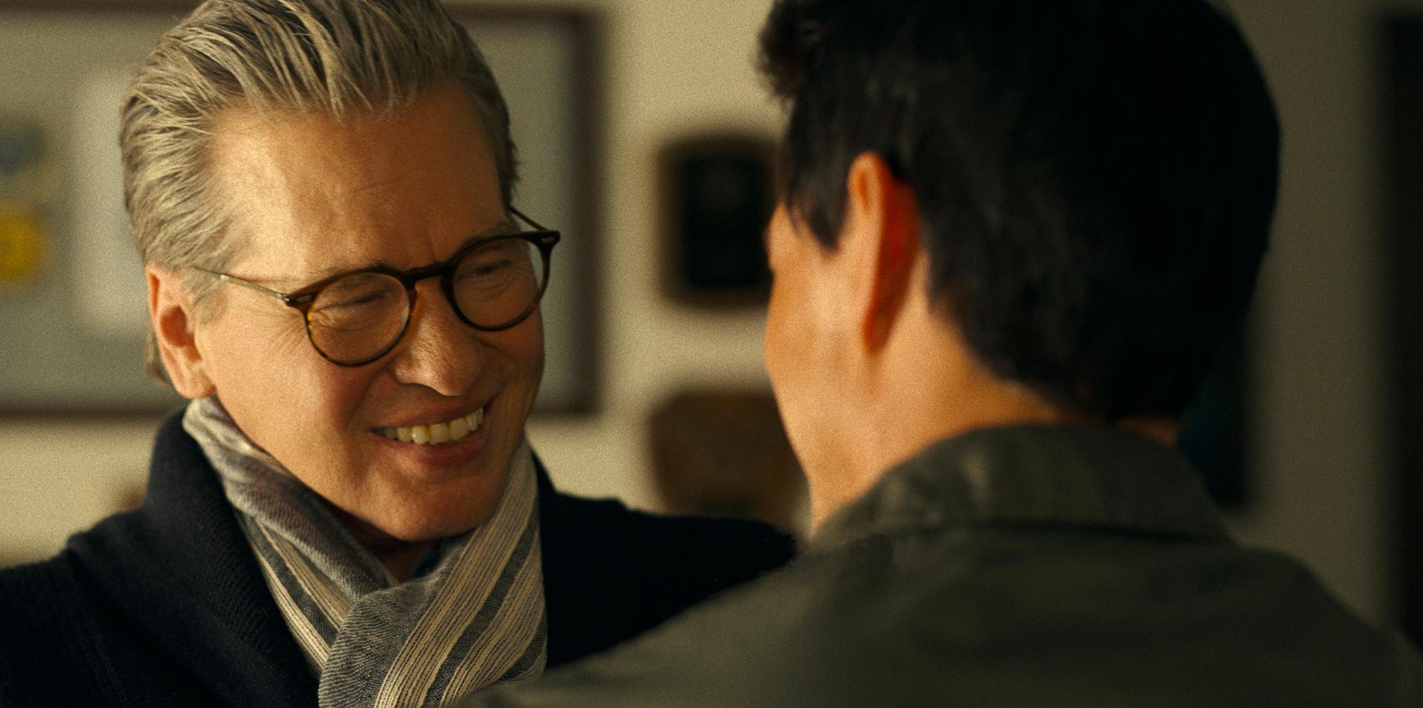 Iceman and Maverick looking fondly at each other